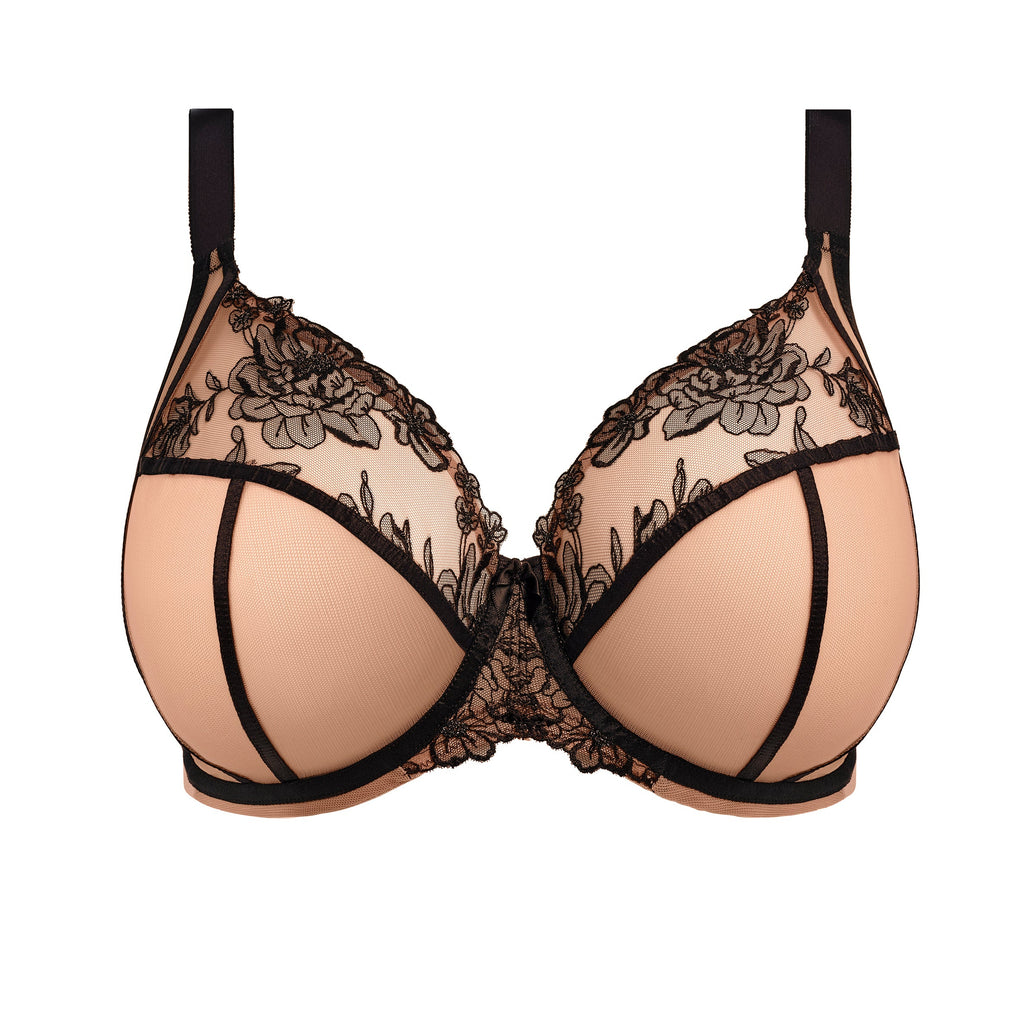 Beige bra with black lace details on a white background